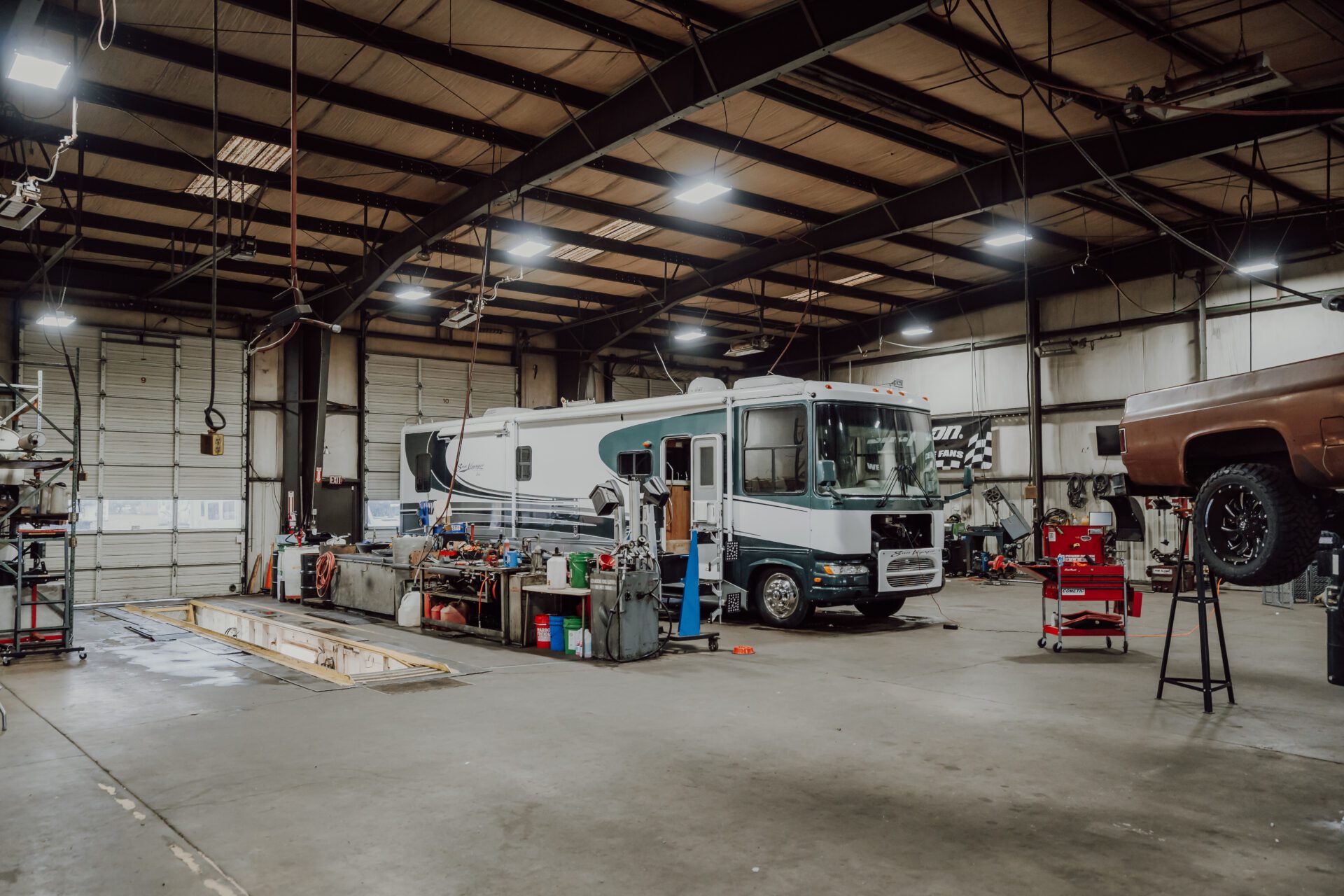 PNWautowork-General-82 A car and RV in garage